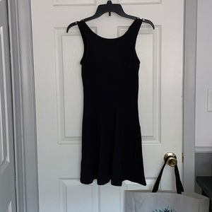 XS simple black dress. Worn twice. Soft and stretchy material. Like new.